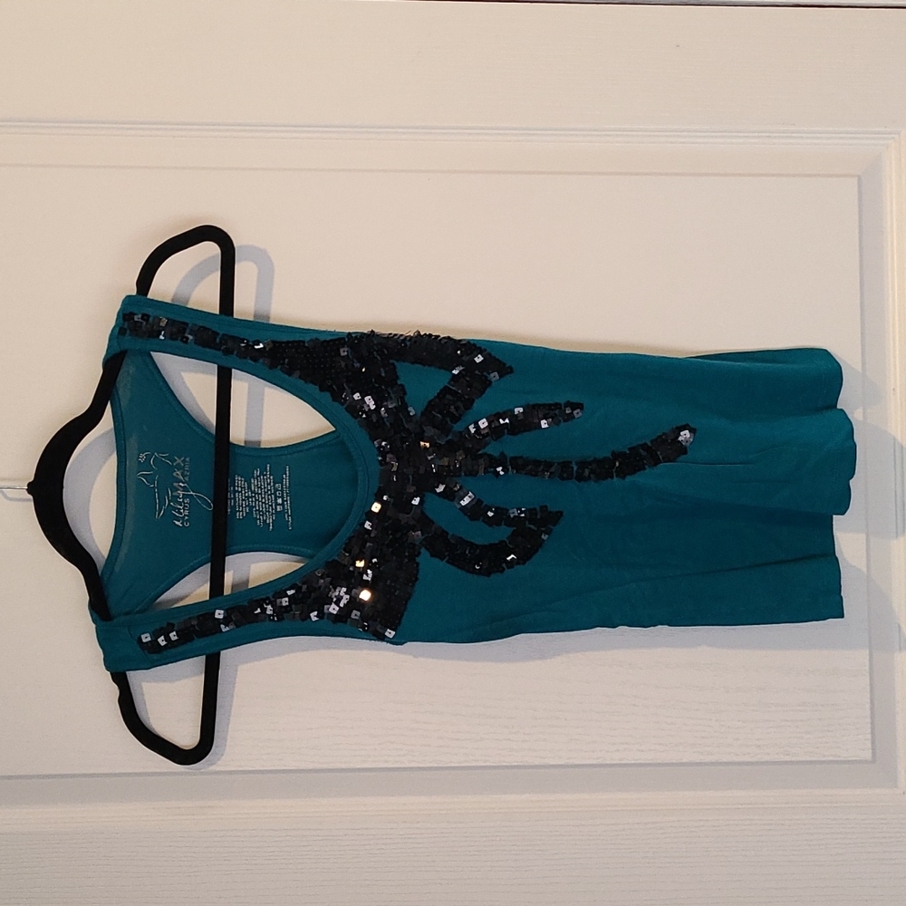 Miley Cyrus teal tank top